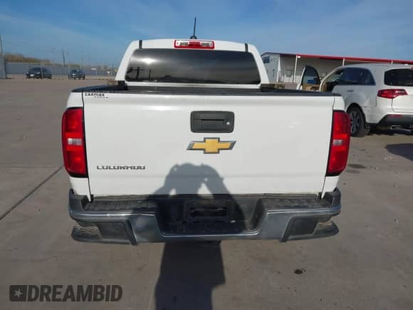 2020 Chevrolet Colorado 2WD Work Truck with VIN 1GCGSBEA1L1121575, listed as a IAAI auction lot 41786579 with 129,499 mi miles and . Bid and sale history available at DreamBid. Image 16.