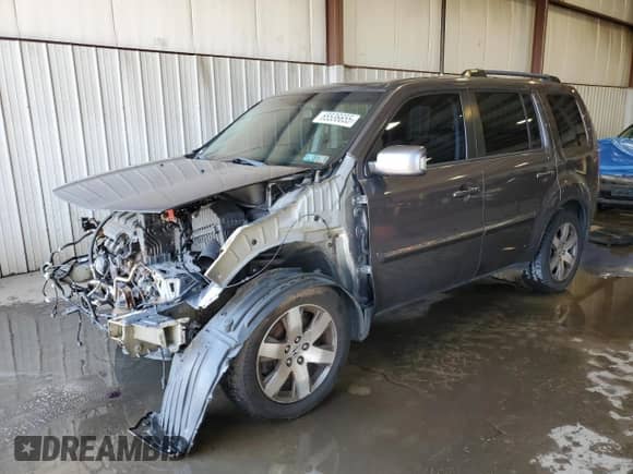 2015 Honda Pilot Touring z VIN 5FNYF4H91FB029481, wystawiony jako Copart lot #65536655 z przebiegiem 196 633 mil mil oraz Szkoda całkowita • Salvage title. Historia ofert i sprzedaży dostępna na DreamBid. Obrazek 1.