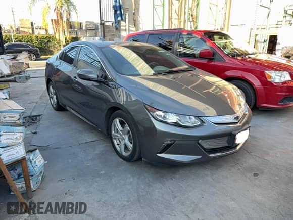 2017 Chevrolet Volt LT z VIN 1G1RC6S57HU129313, wystawiony jako Copart lot #85202155 z przebiegiem 182 919 mil mil oraz Czysty tytuł • Clean title. Historia ofert i sprzedaży dostępna na DreamBid. Obrazek 1.
