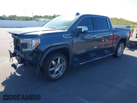 2019 GMC Sierra 1500 Denali z VIN 3GTU9FED7KG169405, wystawiony jako IAAI lot #43343060 z przebiegiem 75 199 mil mil oraz . Historia ofert i sprzedaży dostępna na DreamBid. Obrazek 20.