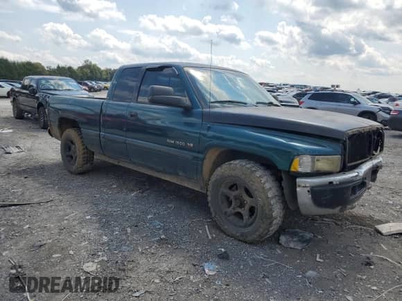 1999 Dodge 1500 с VIN 3B7HC13YXXG206188, выставлен на аукционе Copart как лот 71463125 с пробегом 197 125 миль миль и Чистый • Clean title. История ставок и продаж доступна на DreamBid. Изображение 4.