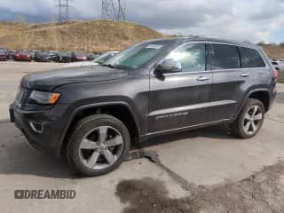 2016 Jeep Grand Cherokee Overland with VIN 1C4RJFCG6GC490047, listed as a Copart auction lot 54076295 with 57,084 mi miles and Salvage title. Bid and sale history available at DreamBid. Image 1.
