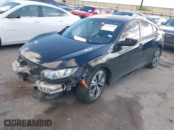 2016 Honda Civic LX z VIN 19XFC2F59GE035184, wystawiony jako IAAI lot #43242650 z przebiegiem 203 773 mil mil oraz . Historia ofert i sprzedaży dostępna na DreamBid. Obrazek 18.