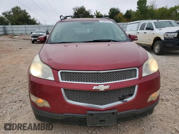2012 Chevrolet Traverse LTZ with VIN 1GNKRLED3CJ131831, listed as a Copart auction lot 84834755 with 209,685 mi miles and Salvage title. Bid and sale history available at DreamBid. Image 5.