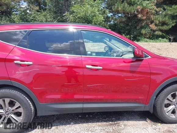 2015 Hyundai Santa Fe with VIN 5XYZUDLB5FG302726, listed as a IAAI auction lot 42947839 with 136,845 mi miles and . Bid and sale history available at DreamBid. Image 13.