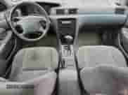 2000 Toyota Camry CE z VIN 4T1BG22K6YU640776, wystawiony jako Copart lot #82269245 z przebiegiem 227 864 mil mil oraz Szkoda całkowita • Salvage title. Historia ofert i sprzedaży dostępna na DreamBid. Obrazek 8.