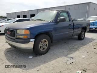 2001 GMC Sierra 1500 SL with VIN 1GTEC14W51Z330120, listed as a Copart auction lot 54144825 with 238,946 mi miles and Clean title. Bid and sale history available at DreamBid. Image 1.