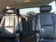 2009 Chevrolet Tahoe 2LT z VIN 1GNFK230X9R295149, wystawiony jako Copart lot #69832915 z przebiegiem 141 619 mil mil oraz Szkoda całkowita • Salvage title. Historia ofert i sprzedaży dostępna na DreamBid. Obrazek 10.