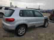 2013 Volkswagen Tiguan S с VIN WVGBV3AX7DW593622, выставлен на аукционе Copart как лот 81320465 с пробегом 167 774 миль миль и Списание • Salvage title. История ставок и продаж доступна на DreamBid. Изображение 3.