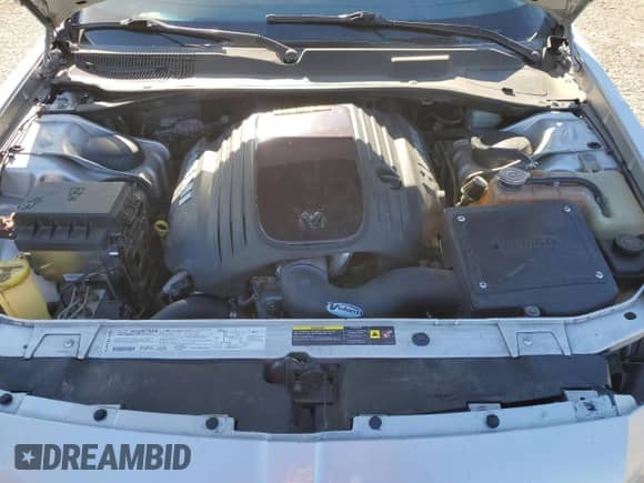 2006 Dodge Magnum R/T с VIN 2D8GV57286H122762, выставлен на аукционе Copart как лот 83399984 с пробегом 200 443 миль миль и Списание • Salvage title. История ставок и продаж доступна на DreamBid. Изображение 12.