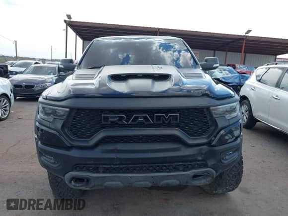 2022 Ram 1500 TRX with VIN 1C6SRFU90NN103186, listed as a IAAI auction lot 42888581 with 53,781 mi miles and . Bid and sale history available at DreamBid. Image 11.