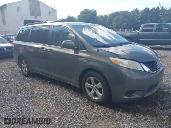 2014 Toyota Sienna LE AAS with VIN 5TDKK3DC0ES414876, listed as a IAAI auction lot 43172800 with 200,070 mi miles and . Bid and sale history available at DreamBid. Image 1.