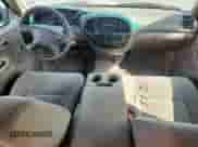 2002 Toyota Tundra SR5 z VIN 5TBRN34102S254202, wystawiony jako Copart lot #71814075 z przebiegiem 167 582 mil mil oraz Szkoda całkowita • Salvage title. Historia ofert i sprzedaży dostępna na DreamBid. Obrazek 8.