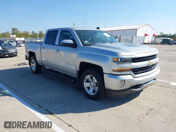2018 Chevrolet Silverado 1500 LT with VIN 3GCUKREC4JG339988, listed as a IAAI auction lot 43222960 with 162,440 mi miles and . Bid and sale history available at DreamBid. Image 1.
