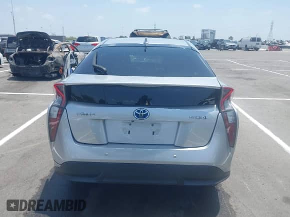 2017 Toyota Prius Two z VIN JTDKARFU0H3042988, wystawiony jako IAAI lot #42580166 z przebiegiem 169 300 mil mil oraz . Historia ofert i sprzedaży dostępna na DreamBid. Obrazek 16.