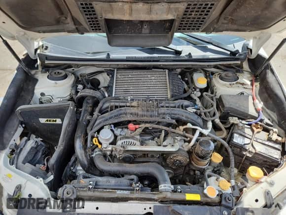 2016 Subaru WRX z VIN JF1VA1B69G9809308, wystawiony jako Copart lot #71462005 z przebiegiem 130 370 mil mil oraz Szkoda całkowita • Salvage title. Historia ofert i sprzedaży dostępna na DreamBid. Obrazek 11.