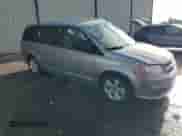 2017 Dodge Grand Caravan SE with VIN 2C4RDGBG2HR624852, listed as a Copart auction lot 84373115 with 141,702 mi miles and Salvage title. Bid and sale history available at DreamBid. Image 4.