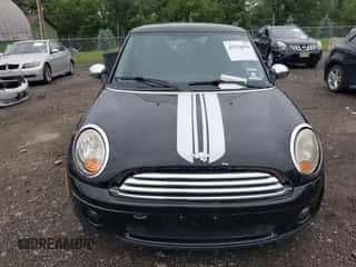 2009 MINI Hardtop with VIN WMWMF33539TW76329, listed as a IAAI auction lot 42512079 with 94,865 mi miles and . Bid and sale history available at DreamBid. Image 6.