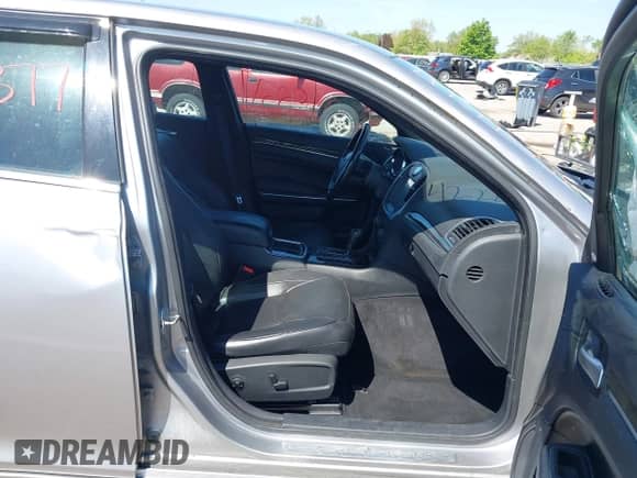 2013 Chrysler 300 C with VIN 2C3CCAKT2DH665439, listed as a IAAI auction lot 42228377 with 137,395 mi miles and . Bid and sale history available at DreamBid. Image 5.