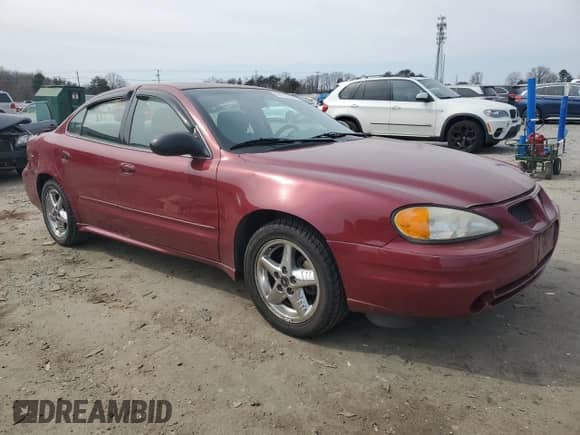 2004 Pontiac Grand Am SE1 with VIN 1G2NF52F44M565096, listed as a Copart auction lot 47833585 with 118,189 mi miles and Salvage title. Bid and sale history available at DreamBid. Image 4.