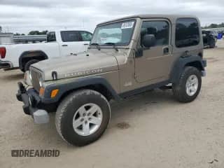 2004 Jeep Wrangler Rubicon with VIN 1J4FA69S34P756394, listed as a Copart auction lot 86123855 with 62,500 mi miles and Clean title. Bid and sale history available at DreamBid. Image 1.