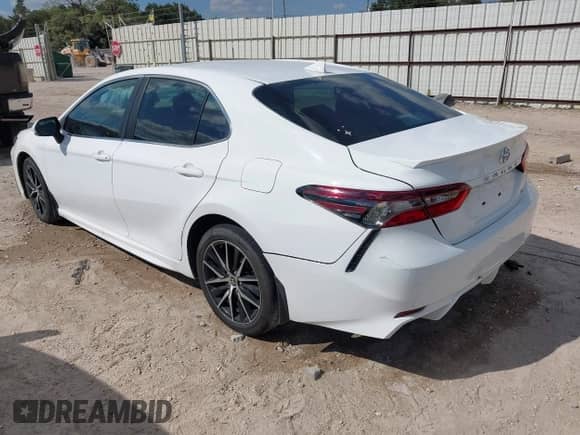 2023 Toyota Camry SE with VIN 4T1G11AKXPU755740, listed as a IAAI auction lot 43464689 with 35,445 mi miles and . Bid and sale history available at DreamBid. Image 3.