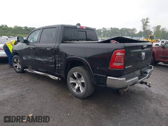 2019 Ram 1500 Laramie with VIN 1C6RREJT3KN502713, listed as a IAAI auction lot 42509778 with 83,837 mi miles and . Bid and sale history available at DreamBid. Image 3.
