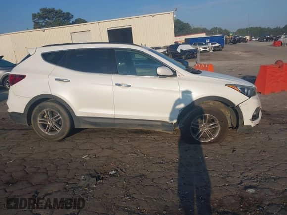 2017 Hyundai Santa Fe 2.4L with VIN 5NMZUDLBXHH032305, listed as a IAAI auction lot 43267307 with 139,069 mi miles and . Bid and sale history available at DreamBid. Image 13.