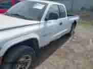 2000 Dodge Dakota Sport z VIN 1B7GG22N1YS522098, wystawiony jako IAAI lot #42690974 z przebiegiem 197 815 mil mil oraz . Historia ofert i sprzedaży dostępna na DreamBid. Obrazek 6.
