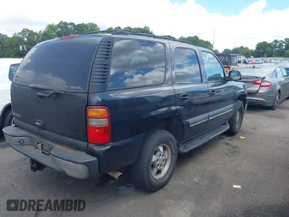 2003 Chevrolet Tahoe LS with VIN 1GNEC13Z43J140992, listed as a IAAI auction lot 42785653 with 331,831 mi miles and . Bid and sale history available at DreamBid. Image 4.