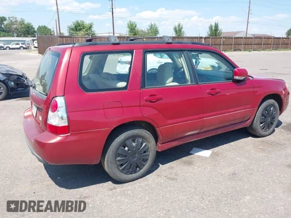 2007 Subaru Forester X with VIN JF1SG65677H702239, listed as a IAAI auction lot 42968572 with 212,781 mi miles and . Bid and sale history available at DreamBid. Image 4.