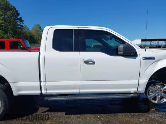 2018 Ford F-150 XL z VIN 1FTFX1E55JKC30834, wystawiony jako IAAI lot #43320333 z przebiegiem 95 773 mil mil oraz . Historia ofert i sprzedaży dostępna na DreamBid. Obrazek 14.