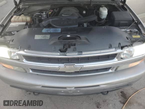 2005 Chevrolet Suburban LS with VIN 3GNFK16Z75G127872, listed as a Copart auction lot 77887864 with 201,471 mi miles and Salvage title. Bid and sale history available at DreamBid. Image 12.