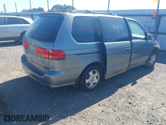 2001 Honda Odyssey EX z VIN 2HKRL18601H610966, wystawiony jako IAAI lot #43380576 z przebiegiem 184 426 mil mil oraz . Historia ofert i sprzedaży dostępna na DreamBid. Obrazek 4.