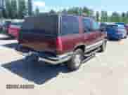 1995 Chevrolet Tahoe z VIN 1GNEK13K2SJ424433, wystawiony jako IAAI lot #42455752 z przebiegiem 221 469 mil mil oraz . Historia ofert i sprzedaży dostępna na DreamBid. Obrazek 4.
