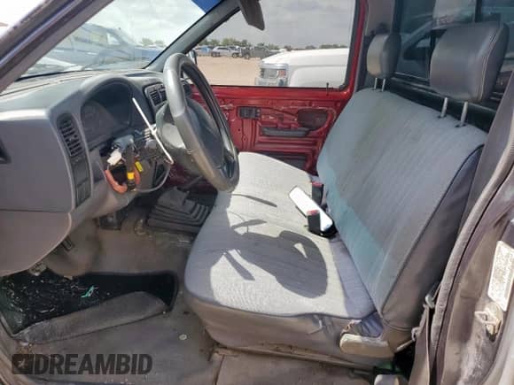 1996 Nissan Frontier XE with VIN 1N6SD11S2TC337322, listed as a Copart auction lot 59141775 with 174,109 mi miles and Salvage title. Bid and sale history available at DreamBid. Image 7.