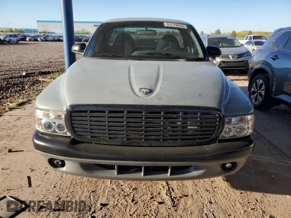 1997 Dodge Dakota z VIN 1B7FL26X9VS139735, wystawiony jako Copart lot #55270635 z przebiegiem 163 867 mil mil oraz Czysty tytuł • Clean title. Historia ofert i sprzedaży dostępna na DreamBid. Obrazek 5.