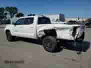 2018 Toyota Tacoma SR5 z VIN 3TMBZ5DN7JM014784, wystawiony jako Copart lot #55620295 z przebiegiem 69 331 mil mil oraz Szkoda całkowita • Salvage title. Historia ofert i sprzedaży dostępna na DreamBid. Obrazek 2.