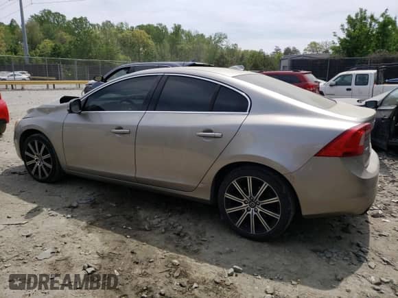 2015 Volvo S60 T6 Drive-E with VIN YV149MFK0F1351673, listed as a Copart auction lot 54271335 with 127,098 mi miles and Salvage title. Bid and sale history available at DreamBid. Image 2.