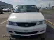 2000 Honda Odyssey EX с VIN 2HKRL186XYH581728, выставлен на аукционе Copart как лот 60740075 с пробегом 239 106 миль миль и Списание • Salvage title. История ставок и продаж доступна на DreamBid. Изображение 5.