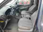 2007 Hyundai Entourage GLS with VIN KNDMC233376023404, listed as a Copart auction lot 69413625 with 135,989 mi miles and Salvage title. Bid and sale history available at DreamBid. Image 7.