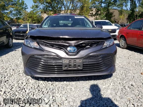 2019 Toyota Camry Hybrid LE z VIN 4T1B31HK9KU512469, wystawiony jako Copart lot #85112345 z przebiegiem 83 416 mil mil oraz Szkoda całkowita • Salvage title. Historia ofert i sprzedaży dostępna na DreamBid. Obrazek 5.