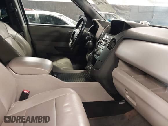 2013 Honda Pilot EX-L with VIN 5FNYF4H74DB055262, listed as a IAAI auction lot 42515947 with 229,037 mi miles and . Bid and sale history available at DreamBid. Image 5.