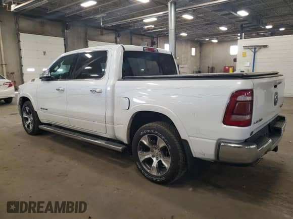 2019 Ram 1500 Laramie with VIN 1C6SRFJT1KN550119, listed as a Copart auction lot 85844925 with 142,066 mi miles and Salvage title. Bid and sale history available at DreamBid. Image 2.