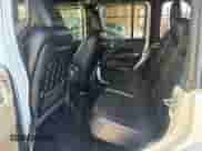 2022 Jeep Wrangler Unlimited Rubicon with VIN 1C4JJXFM9NW134501, listed as a Copart auction lot 90900765 with 25,997 mi miles and Clean title. Bid and sale history available at DreamBid. Image 6.