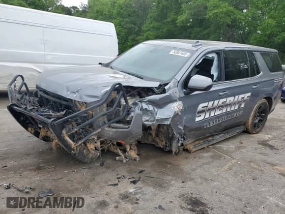 2021 Chevrolet Tahoe Commercial with VIN 1GNSCLED7MR457846, listed as a Copart auction lot 53887485 with 98,510 mi miles and Salvage title. Bid and sale history available at DreamBid. Image 1.