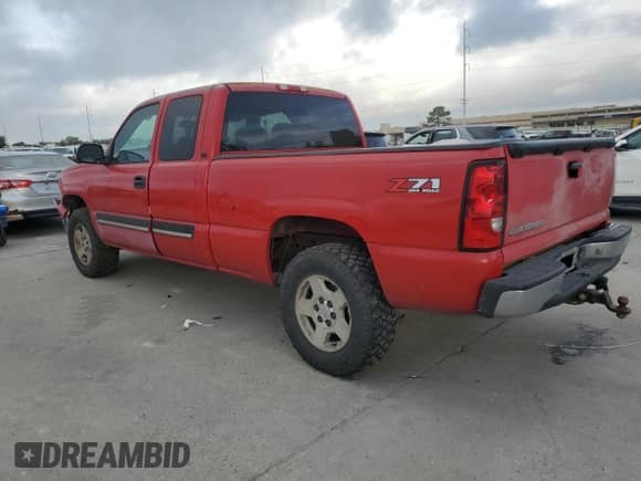 2006 Chevrolet Silverado 1500 LT1 with VIN 1GCEK19V26Z152824, listed as a Copart auction lot 54931185 with 164,438 mi miles and Salvage title. Bid and sale history available at DreamBid. Image 2.