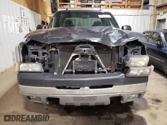 2003 Chevrolet Silverado 2500HD LT z VIN 1GCHK29G03E374026, wystawiony jako Copart lot #66545055 z przebiegiem 121 815 mil mil oraz Czysty tytuł • Clean title. Historia ofert i sprzedaży dostępna na DreamBid. Obrazek 5.