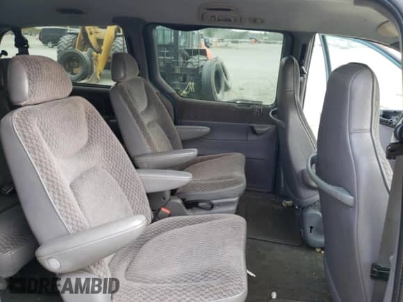 1999 Dodge Caravan SE z VIN 2B4GP44G3XR423211, wystawiony jako Copart lot #69094794 z przebiegiem 158 050 mil mil oraz Szkoda całkowita • Salvage title. Historia ofert i sprzedaży dostępna na DreamBid. Obrazek 10.