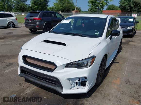 2020 Subaru WRX STI with VIN JF1VA2S62L9812924, listed as a IAAI auction lot 42808812 with 39,216 mi miles and . Bid and sale history available at DreamBid. Image 2.